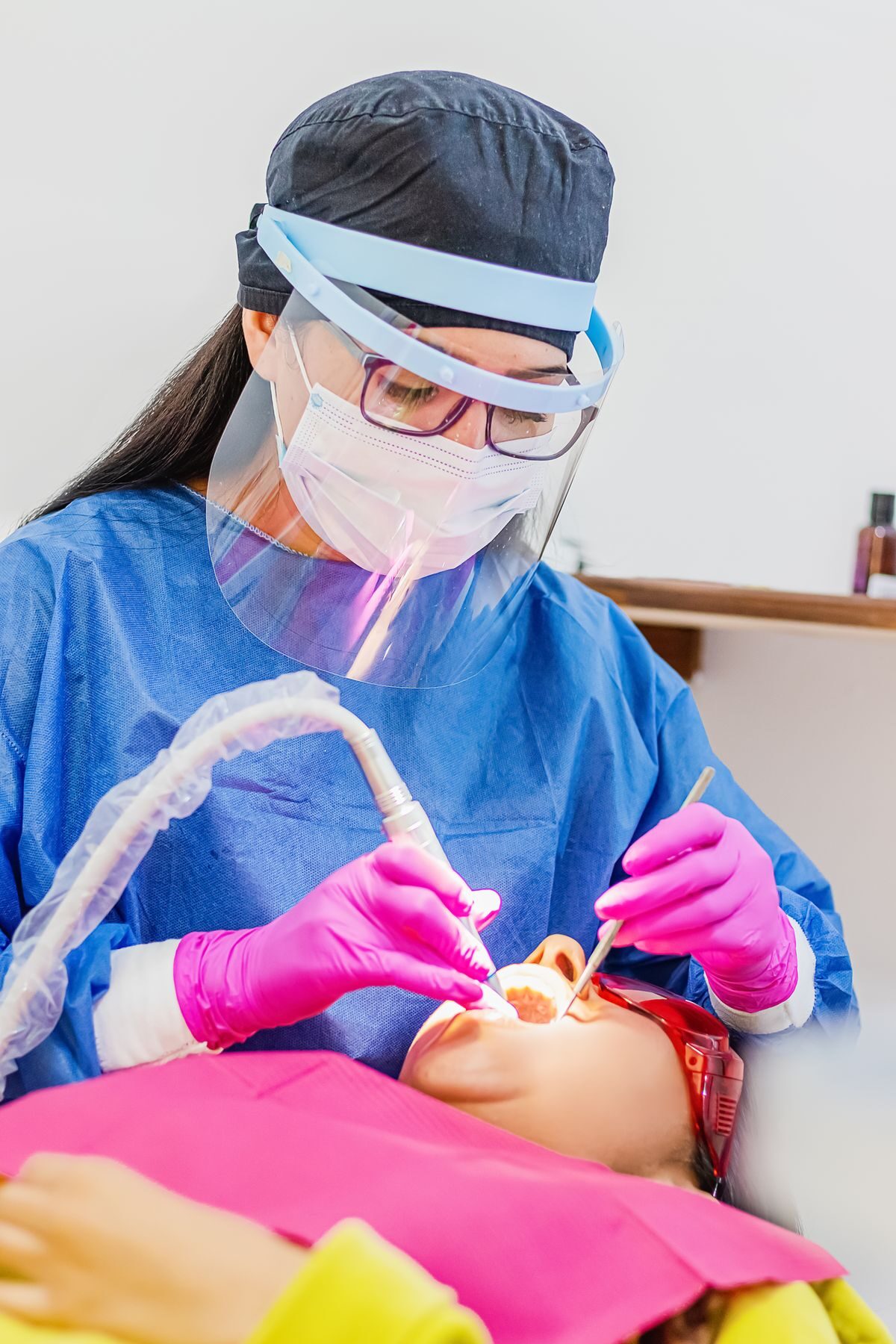 Dental professional carrying out an assessment